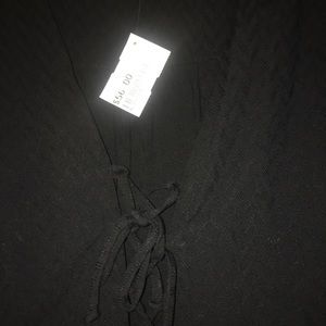 Black bells sleeve blouse tie up front